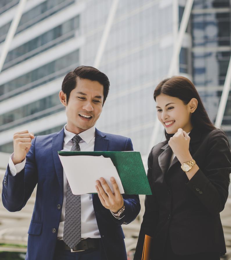 business colleague talking viewing documents outdoor